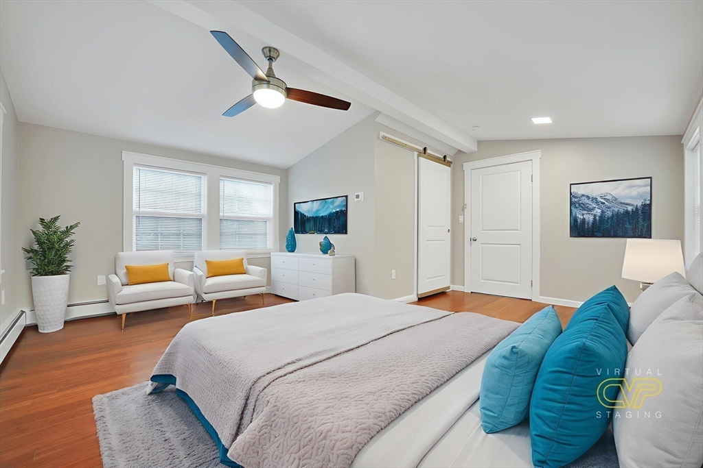 245 Wareham Road Marion, MA 02738 - Photo 25 of 42 a bed room with a bed couch and a window