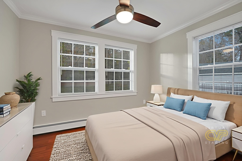 245 Wareham Road Marion, MA 02738 - Photo 28 of 42 a bedroom with a large bed and a window