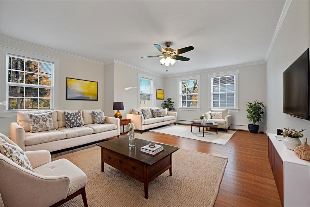 245 Wareham Road Marion, MA 02738 - Photo 31 of 42 a living room with furniture a flat screen tv and a large window