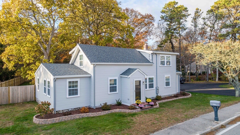 245 Wareham Road Marion, MA 02738 - Photo 35 of 42 a front view of house with yard and green space