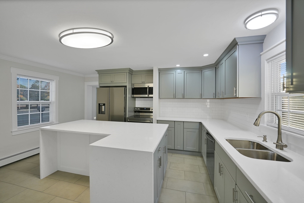 245 Wareham Road Marion, MA 02738 - Photo 7 of 42 a kitchen that has a sink and a stove in it