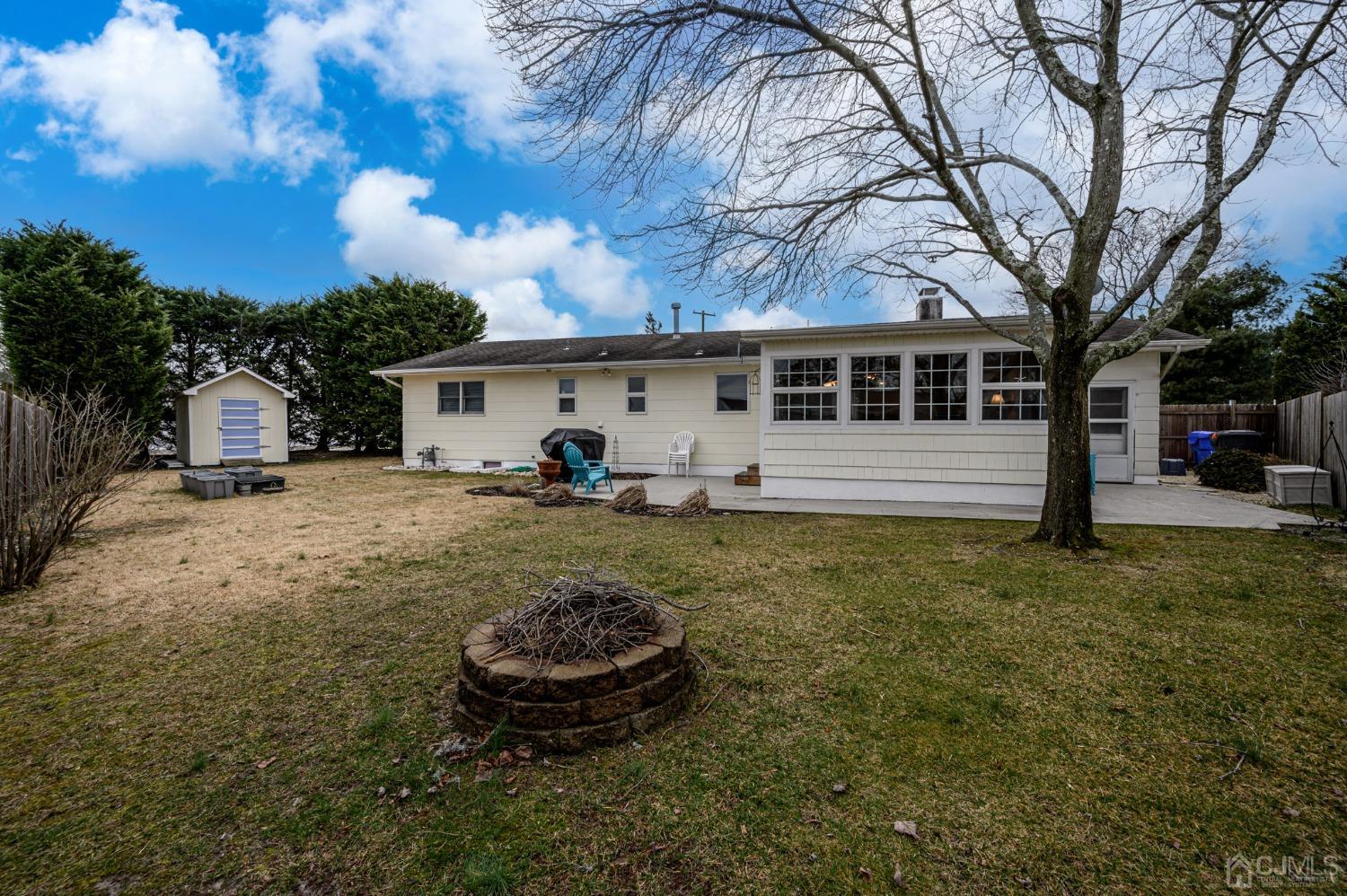 131 Port Road Brick, NJ 08723 - Photo 28 of 43 a front view of a house with a yard