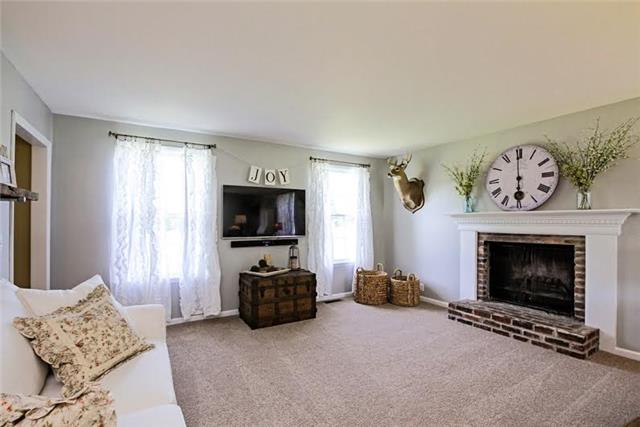104 Ridgewood Road Franklin, TN 37064 - Photo 2 of 20 Upon entering the home, you will see the large living room. The carpet is new and soft enough to sleep on! Curl up by the fireplace on cold winter days.