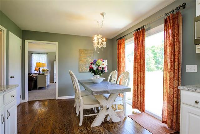 104 Ridgewood Road Franklin, TN 37064 - Photo 8 of 20 Enjoy eating in this naturally lit breakfast area just off the kitchen, with an entrance to the patio. This home has so much natural light throughout!