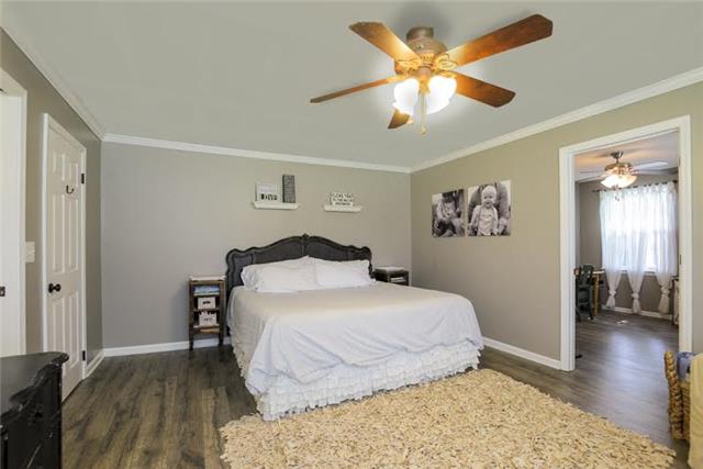 104 Ridgewood Road Franklin, TN 37064 - Photo 9 of 20 Downstairs master bedroom is spacious with gorgeous new flooring.