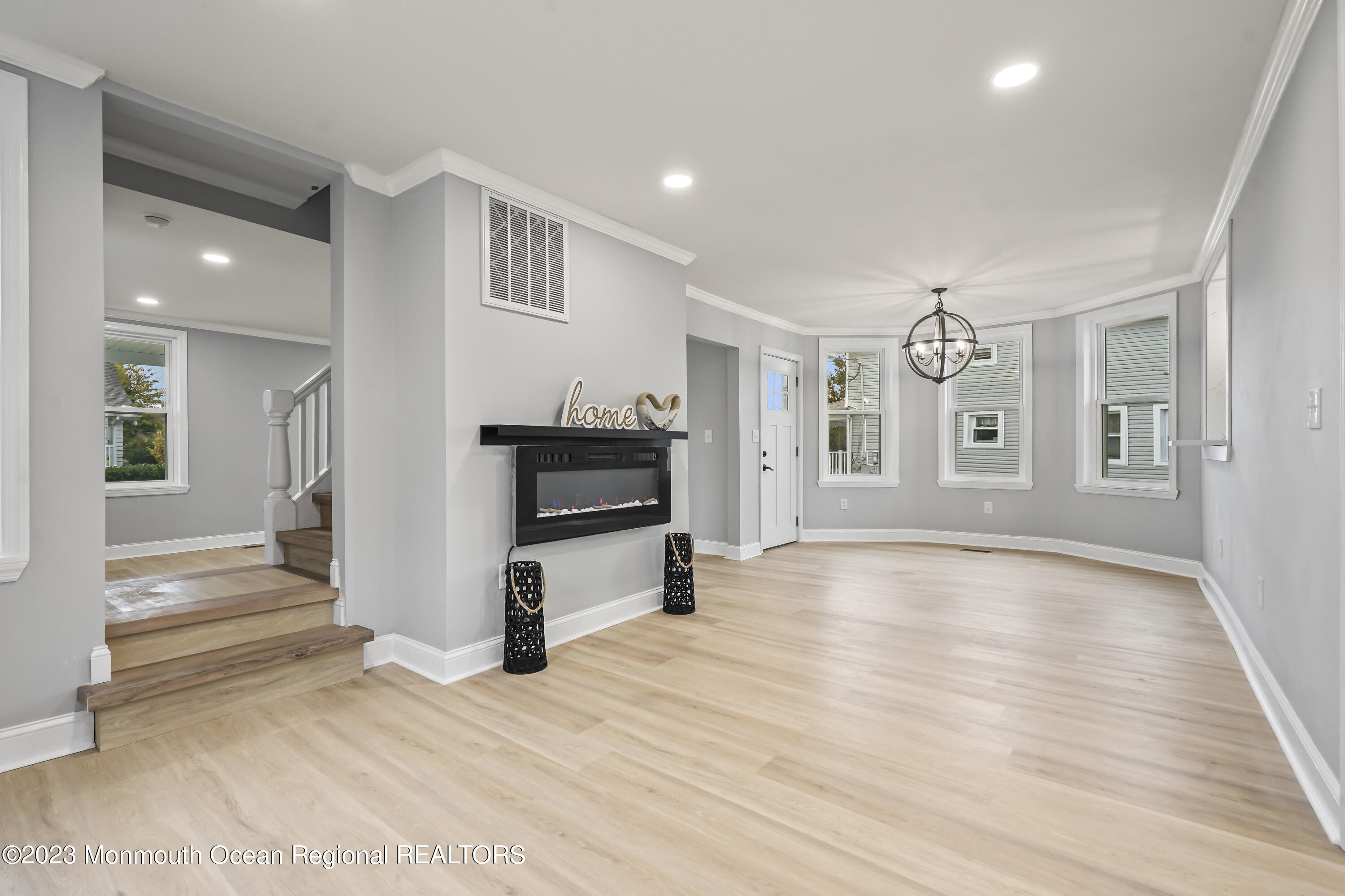 59 Ridge Avenue Neptune City, NJ 07753 - Photo 9 of 20 a view of a livingroom with wooden floor and furniture