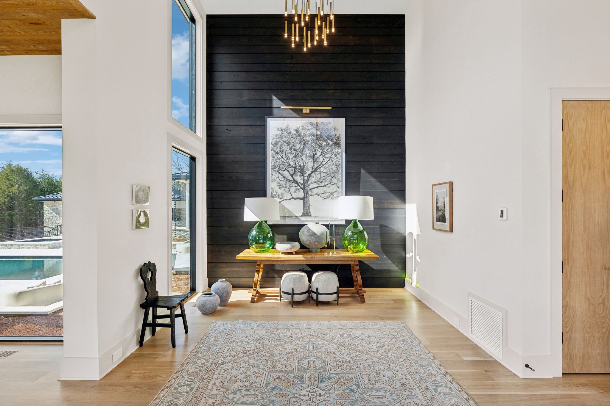 4640 Murfreesboro Road Franklin, TN 37067 - Photo 13 of 79 a living room with furniture and a chandelier