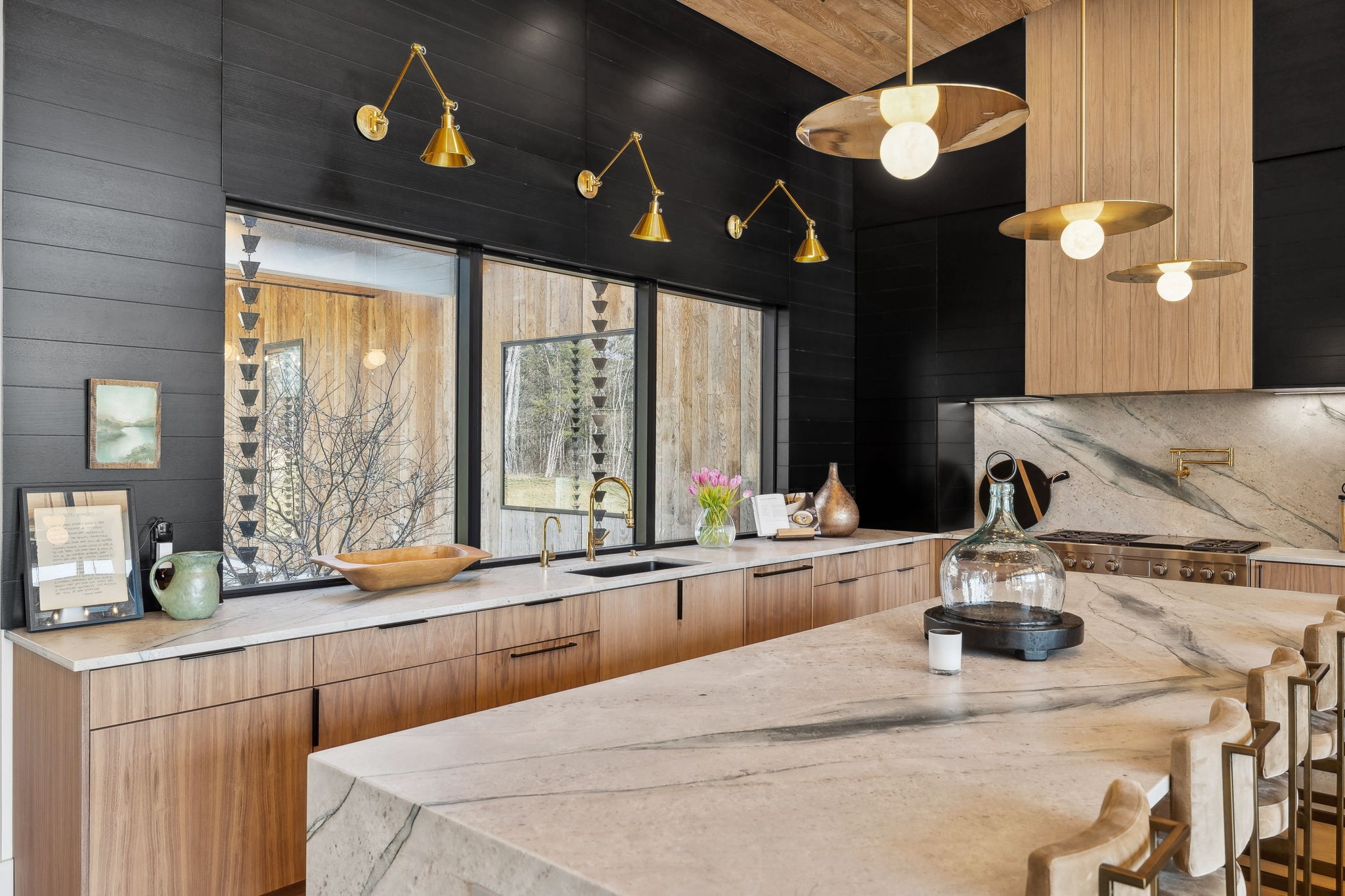 4640 Murfreesboro Road Franklin, TN 37067 - Photo 20 of 79 a kitchen with a sink a counter space and a dining table