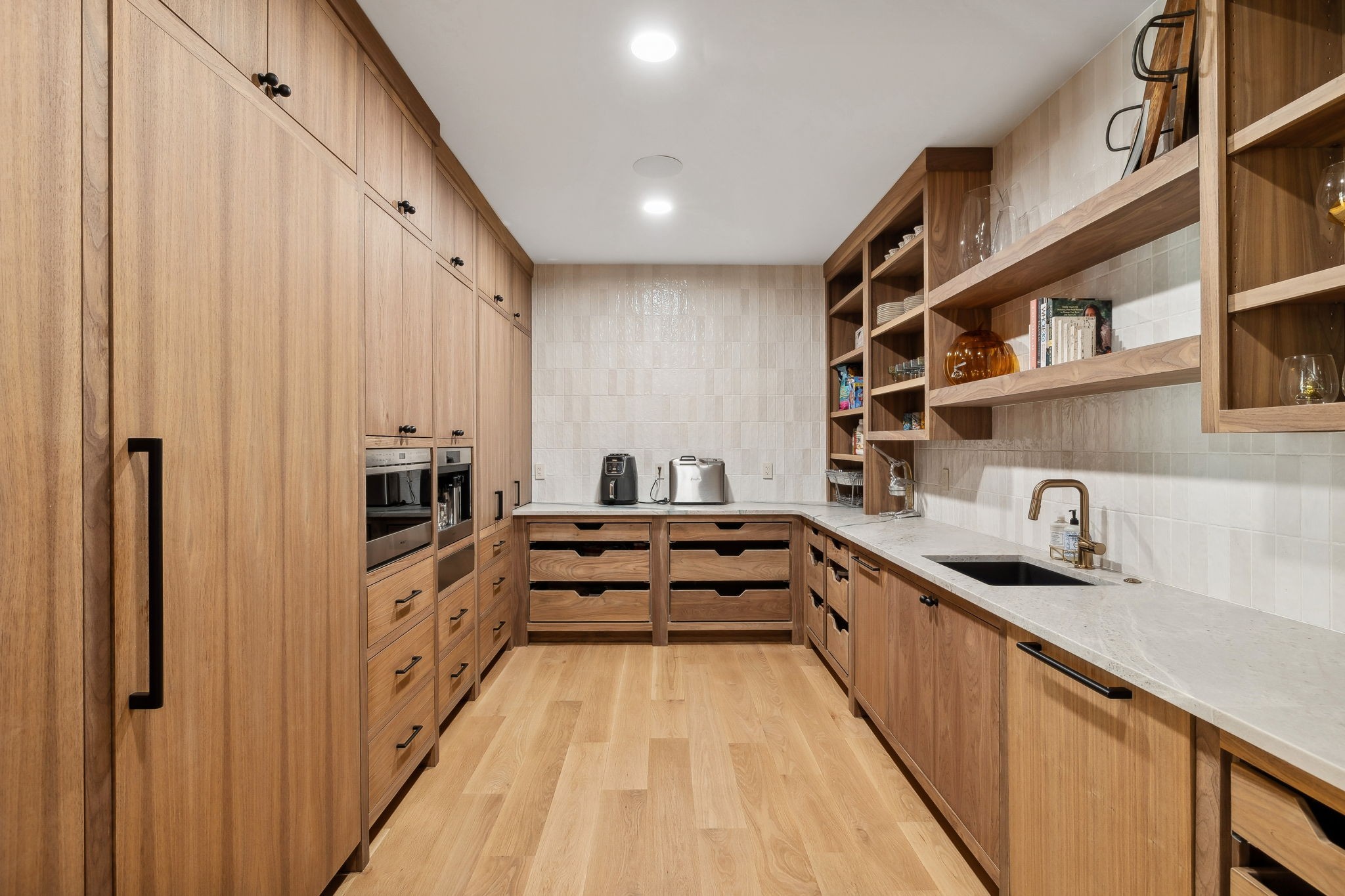 4640 Murfreesboro Road Franklin, TN 37067 - Photo 26 of 79 a kitchen with granite countertop a sink and cabinets