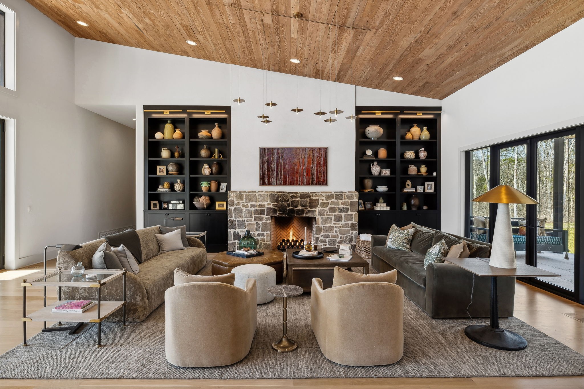 4640 Murfreesboro Road Franklin, TN 37067 - Photo 27 of 79 a living room with furniture a rug and a fireplace