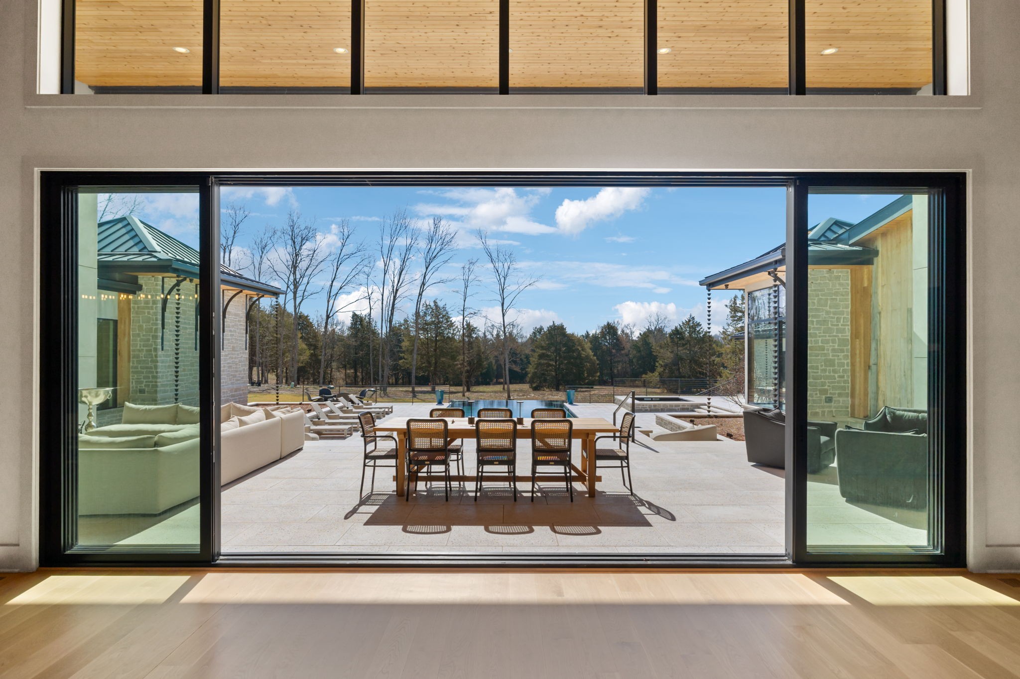 4640 Murfreesboro Road Franklin, TN 37067 - Photo 29 of 79 a view of a patio with a dining table and chairs