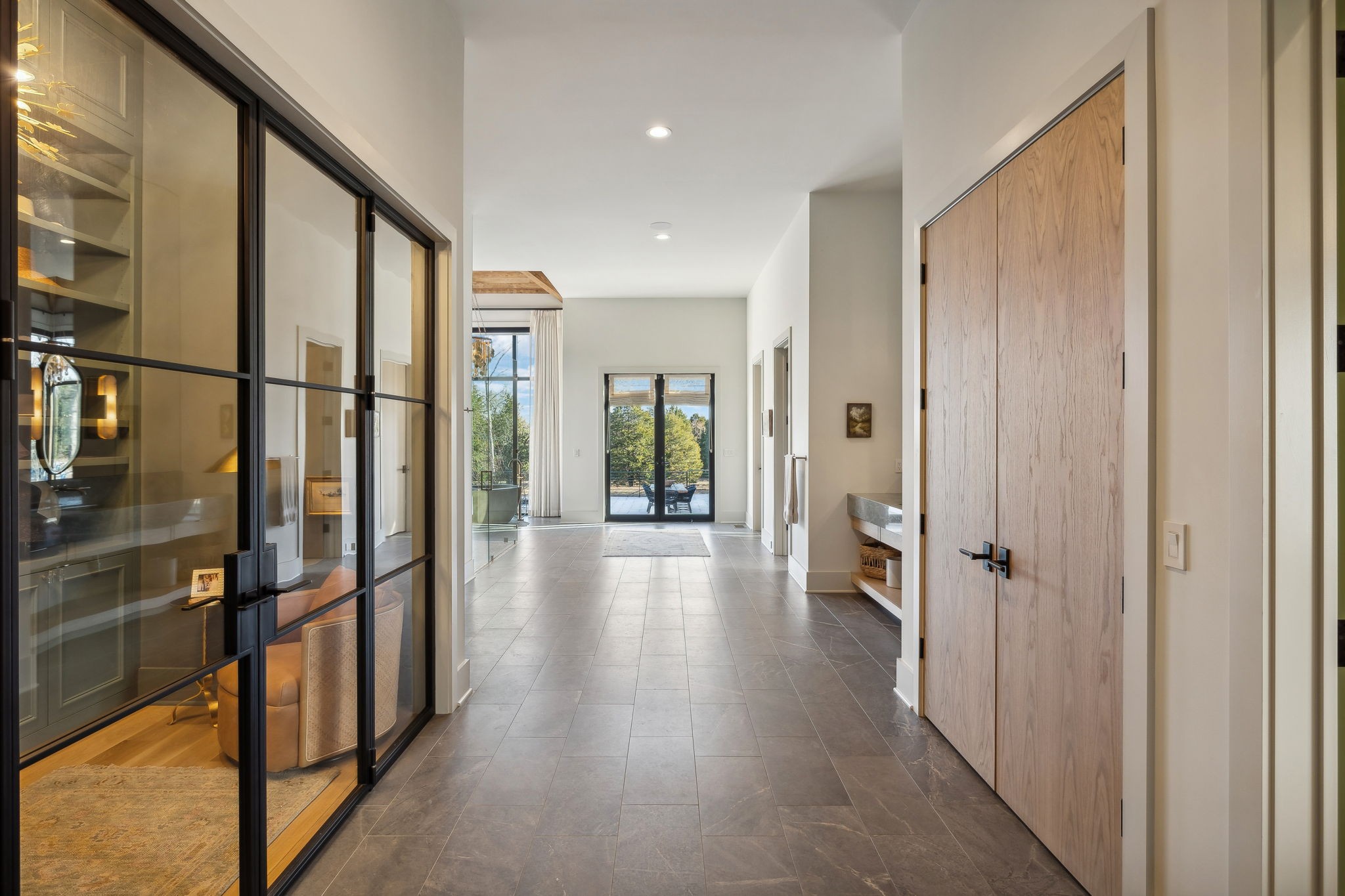 4640 Murfreesboro Road Franklin, TN 37067 - Photo 35 of 79 a view of a hallway with wooden floor and staircase