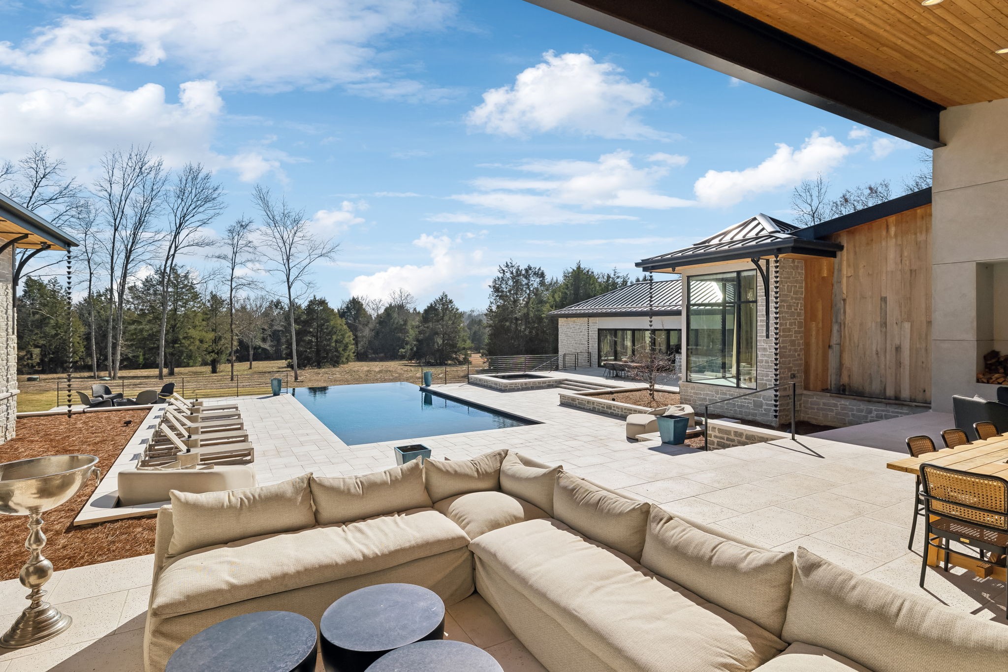 4640 Murfreesboro Road Franklin, TN 37067 - Photo 5 of 79 a view of a patio with couches and a fire pit