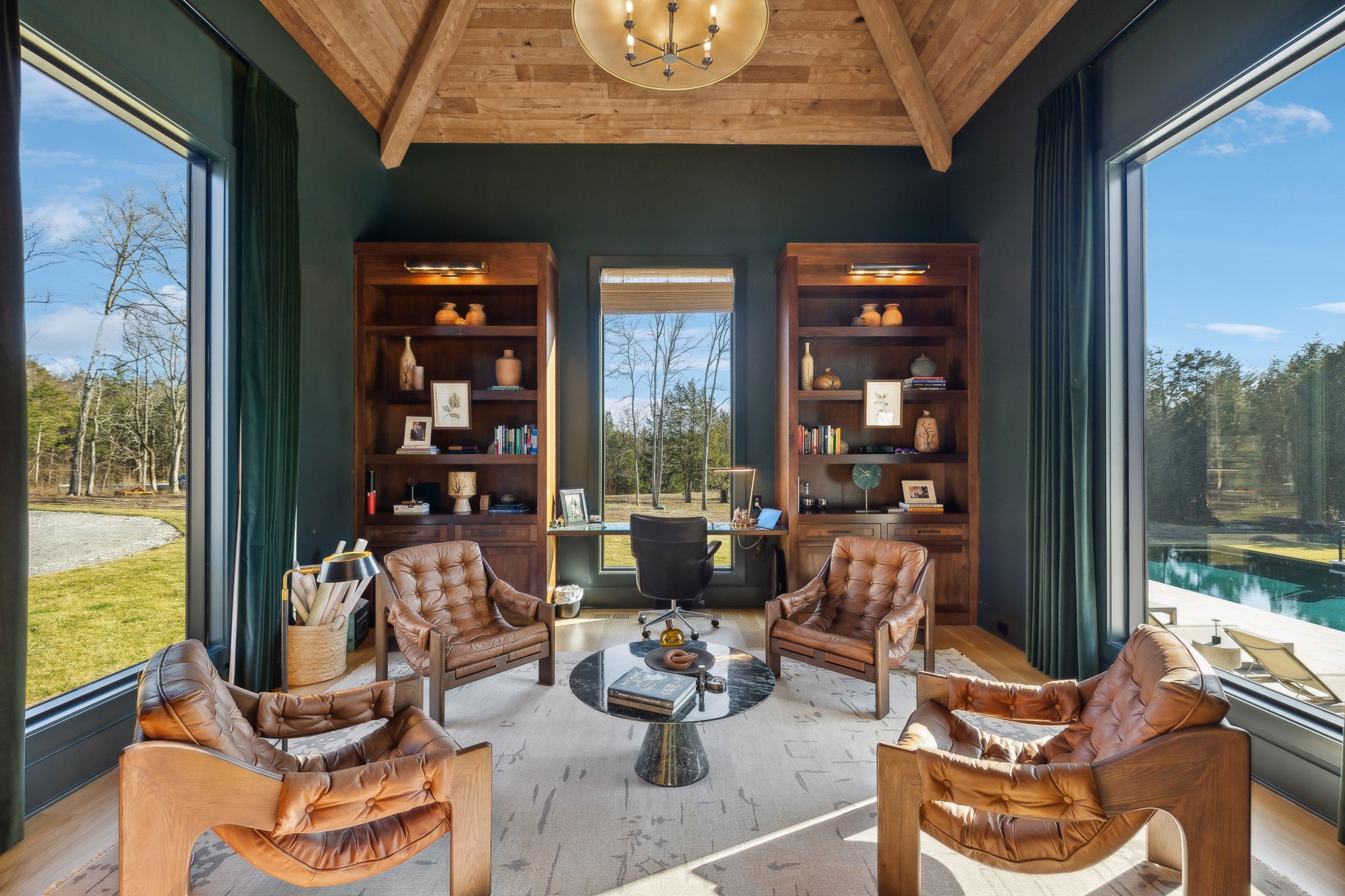 4640 Murfreesboro Road Franklin, TN 37067 - Photo 66 of 79 a living room with furniture and a floor to ceiling window