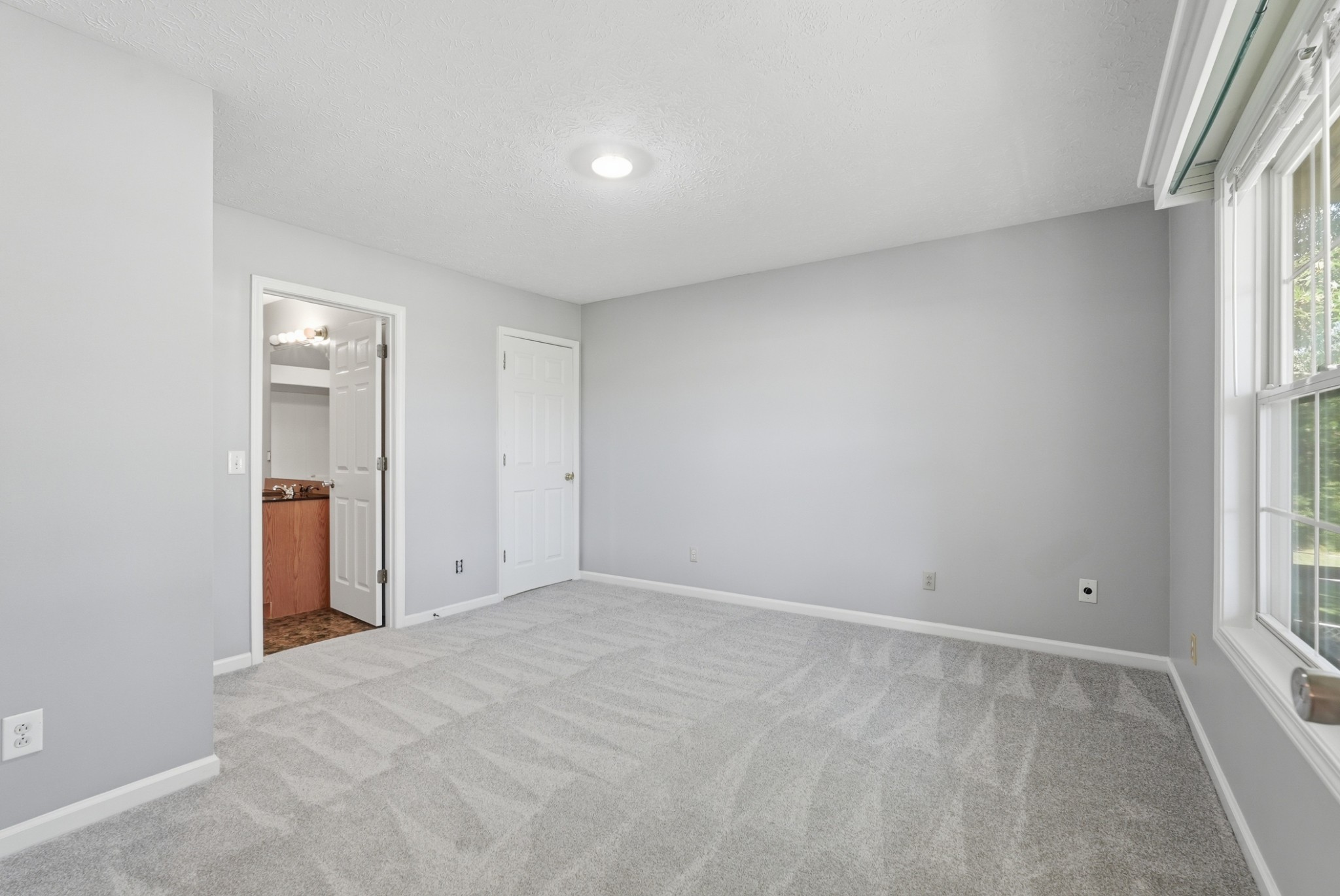 4877 Swafford Road Cookeville, TN 38501 - Photo 18 of 28 a view of an empty room with a window