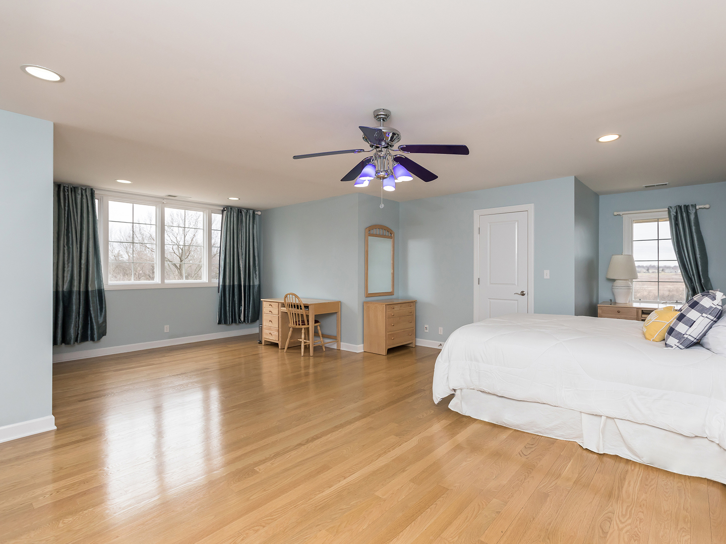 3N480 Fair Oaks Road West Chicago, IL 60185 - Photo 15 of 25 a bedroom with a bed and a chandelier