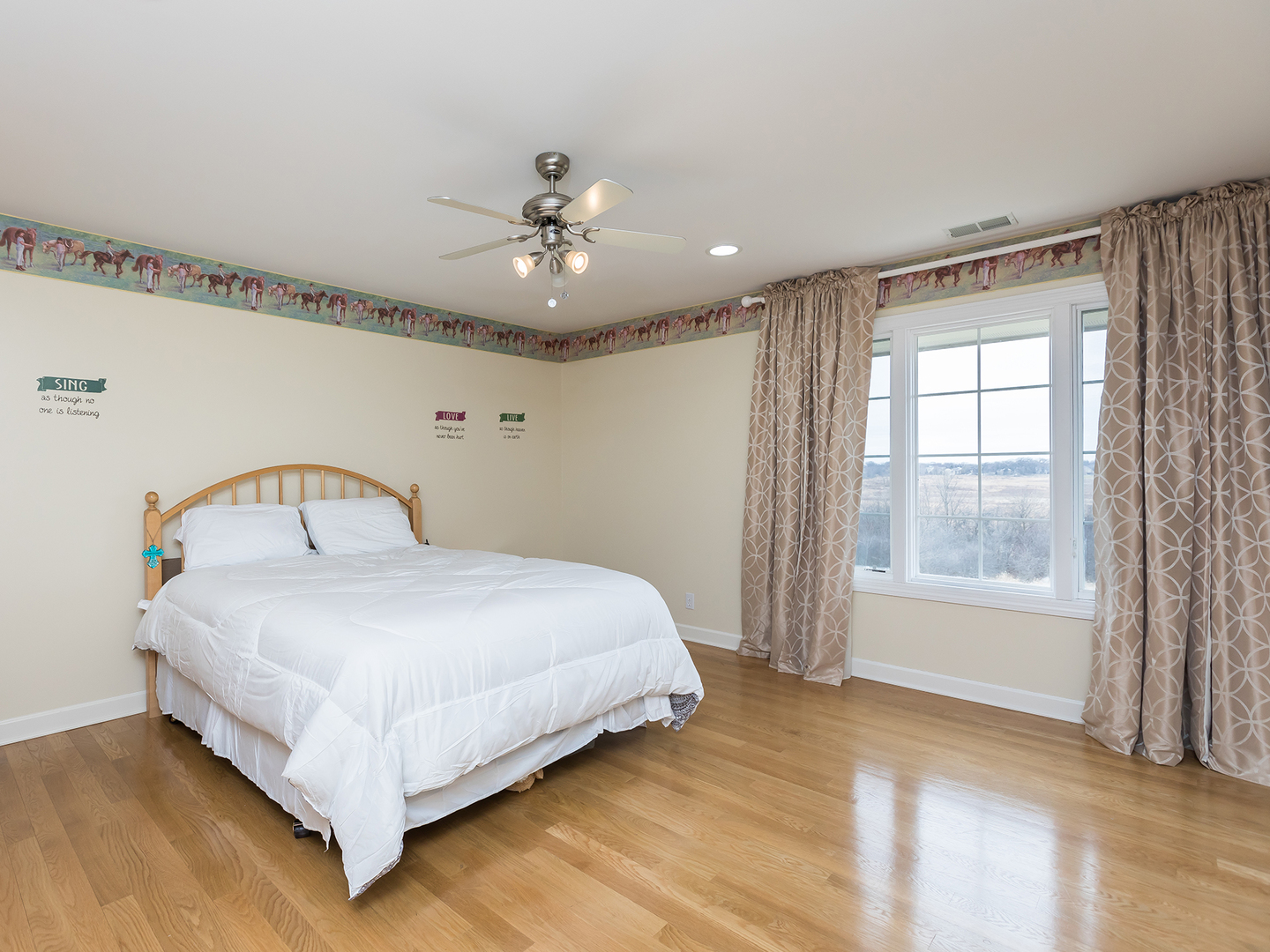 3N480 Fair Oaks Road West Chicago, IL 60185 - Photo 17 of 25 a spacious bedroom with a bed and large window