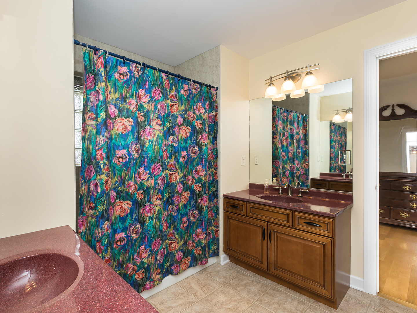 3N480 Fair Oaks Road West Chicago, IL 60185 - Photo 20 of 25 a bathroom with a sink and a mirror