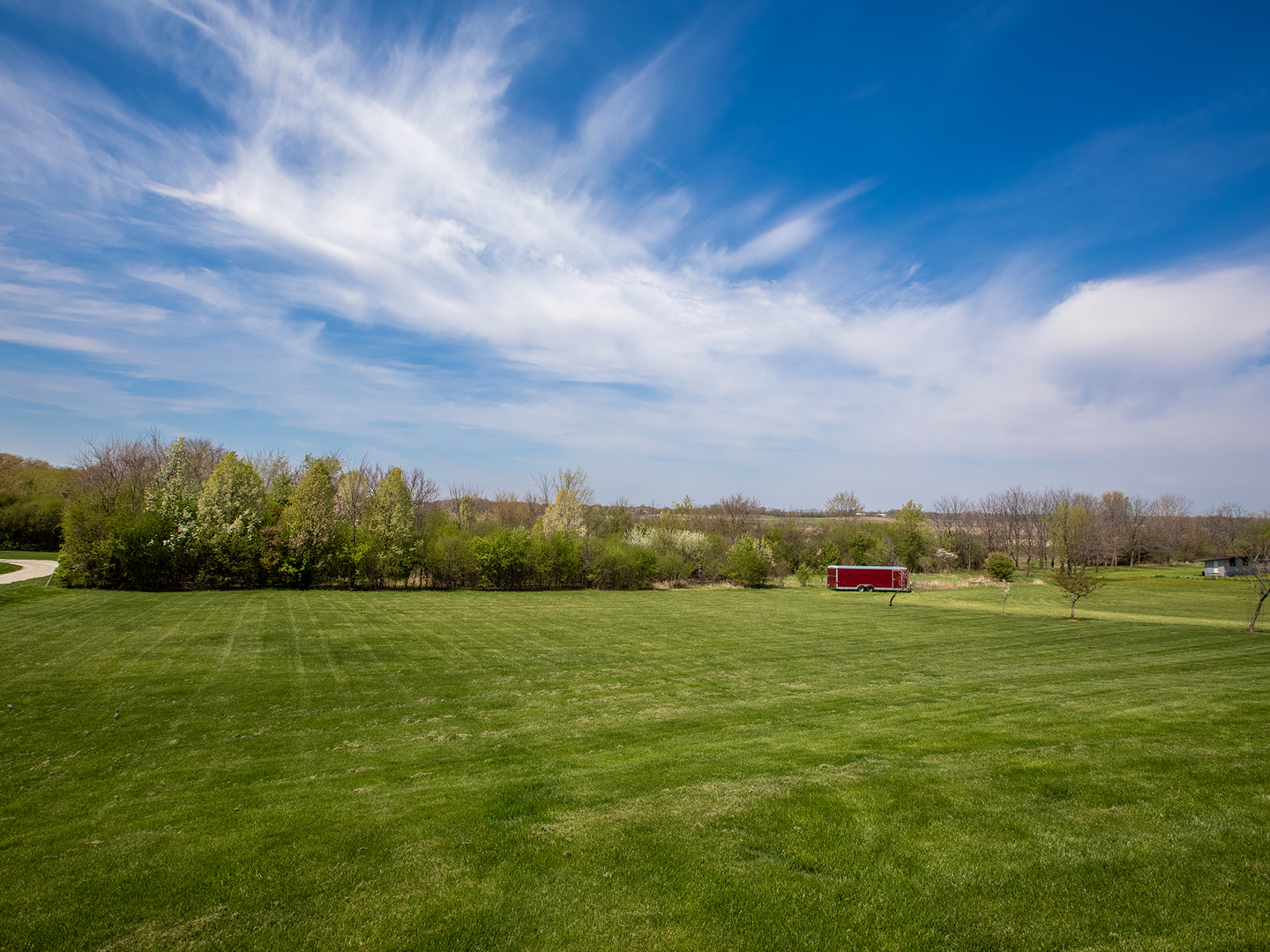 3N480 Fair Oaks Road West Chicago, IL 60185 - Photo 3 of 25 a view of a grassy field with an trees