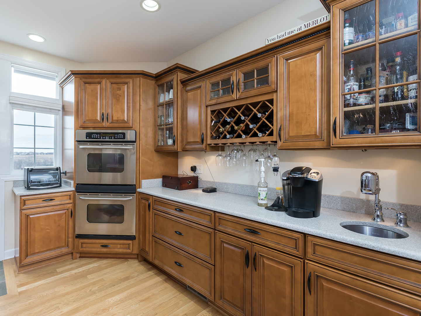 3N480 Fair Oaks Road West Chicago, IL 60185 - Photo 9 of 25 a kitchen with stainless steel appliances a stove sink and microwave