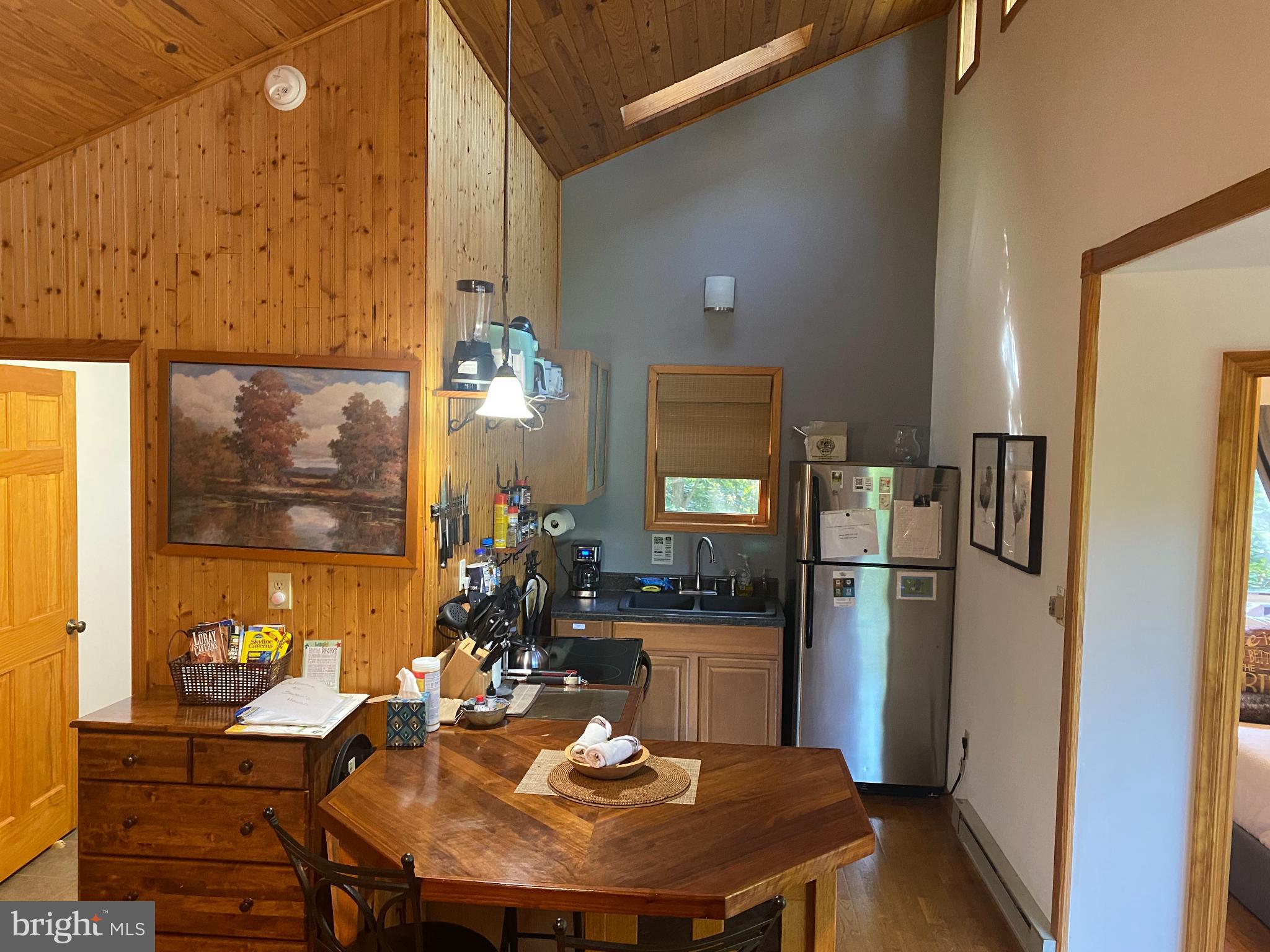 568 Cliff Heights Road Stanley, VA 22851 - Photo 9 of 23 Cozy kitchen with rustic charm and warmth.