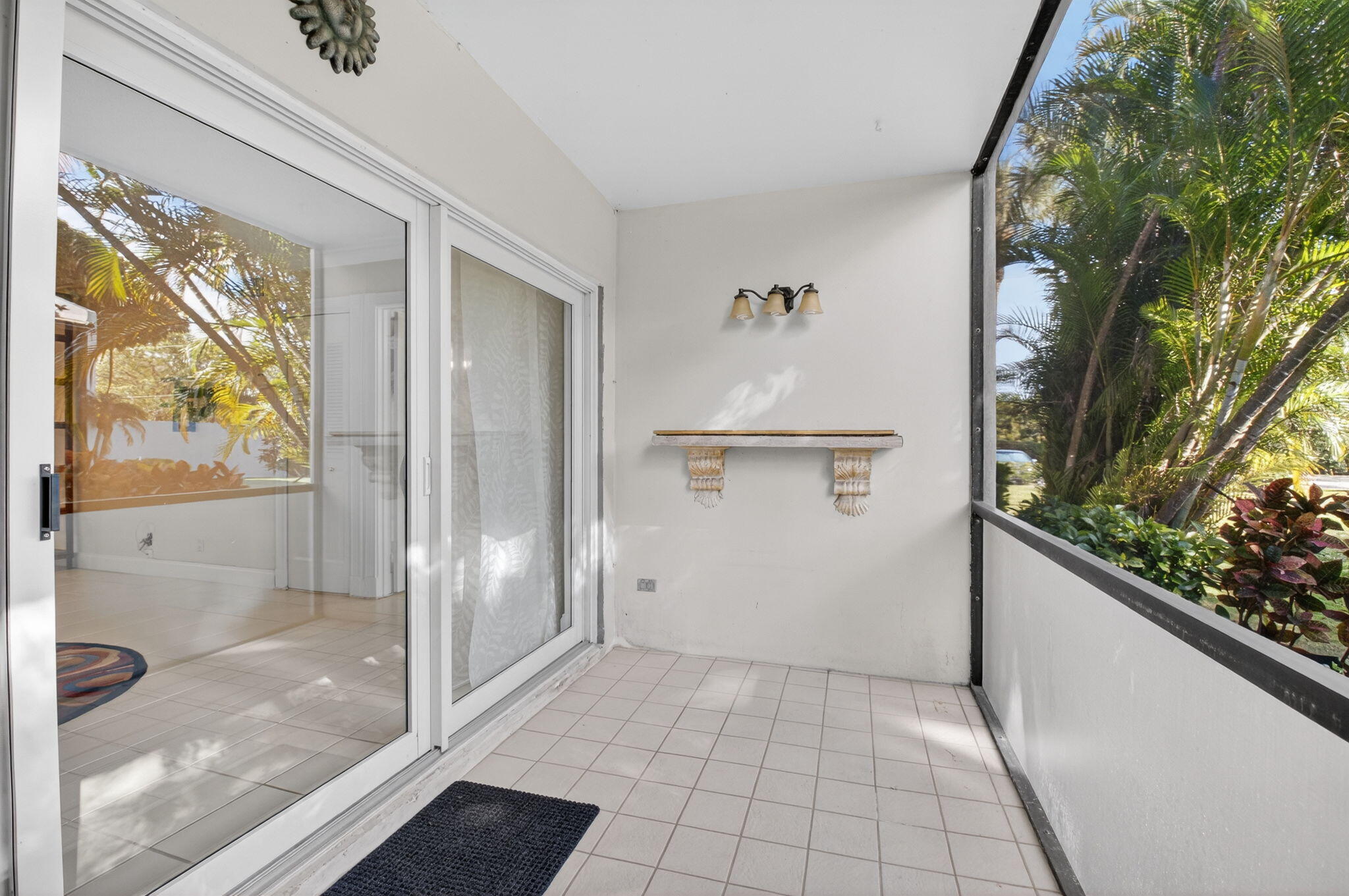 159 Northwest 70th Street, Unit 403 Boca Raton, FL 33487 - Photo 10 of 31 Screened-in porch