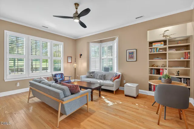 a living room with furniture and window