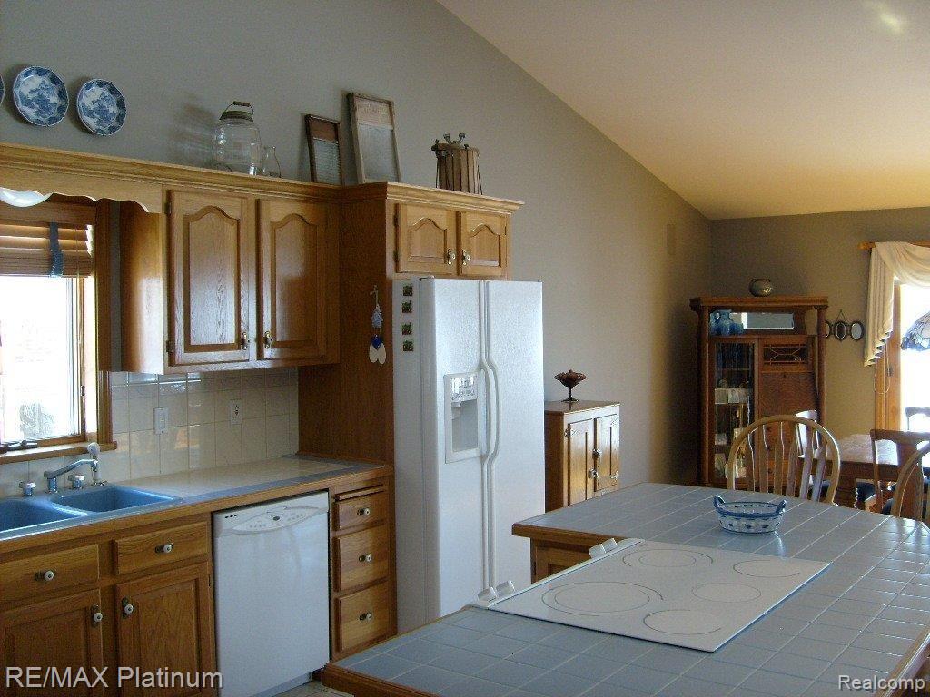 7179 Lobdell Road Linden, MI 48451 - Photo 4 of 11 kitchen in basement