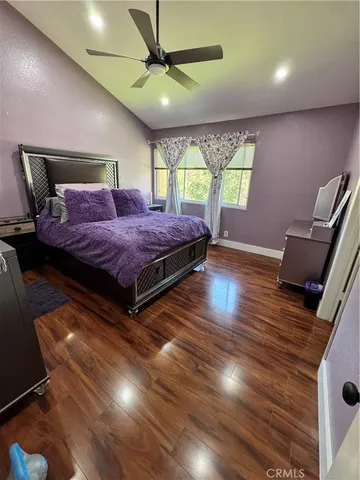 a bed room with a bed and window