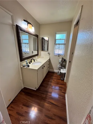 a view of living room with furniture and flat screen tv