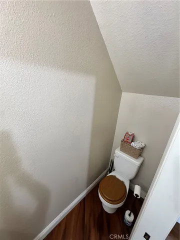 a bathroom with a toilet and a sink