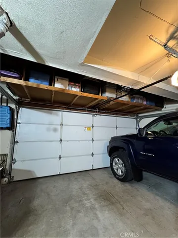 a view of garage and utility room