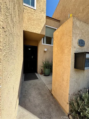a view of a back yard of a building