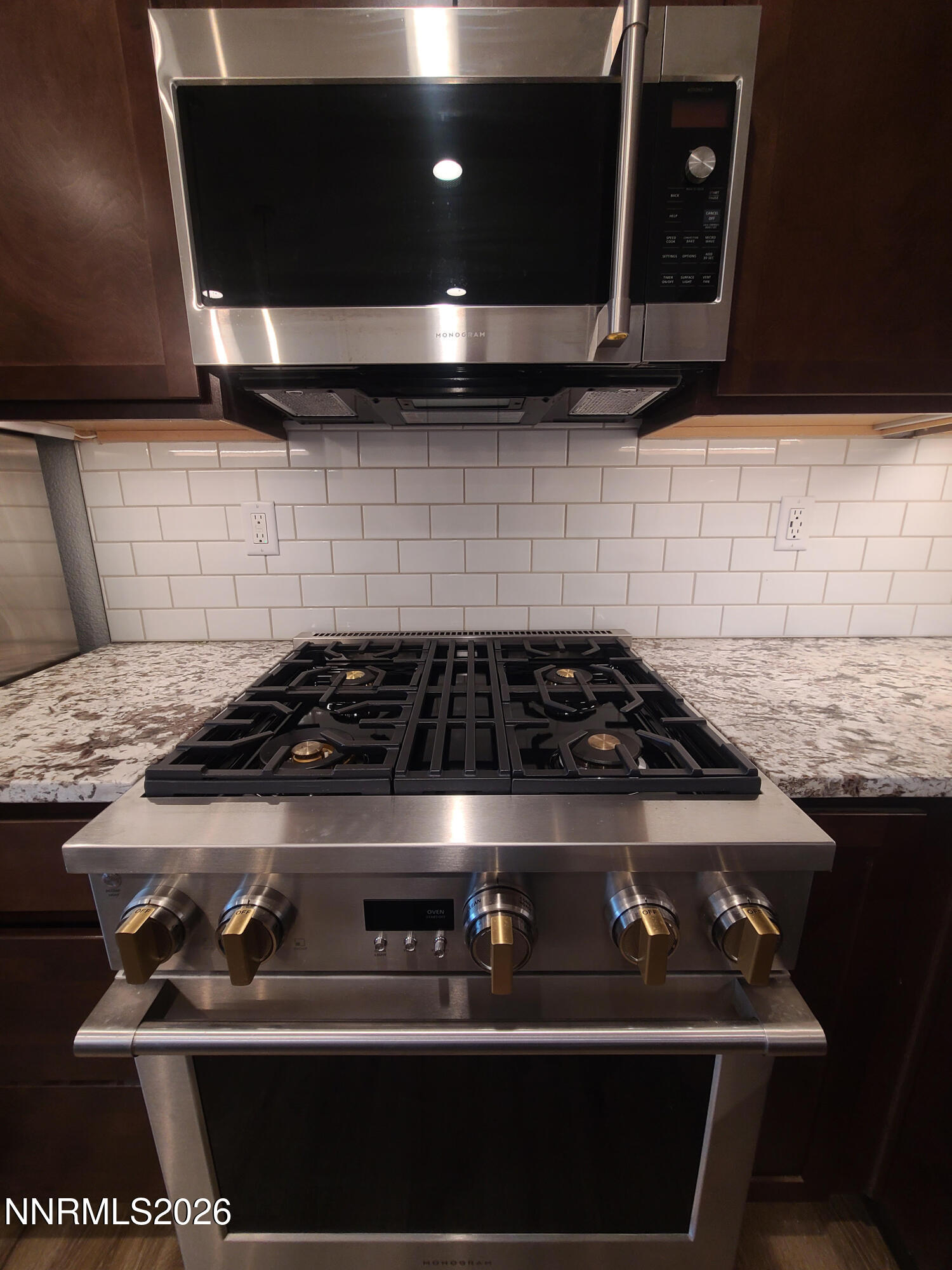 18671 Village Center Drive Reno, NV 89508 - Photo 6 of 24 GE Monogram stove and microwave