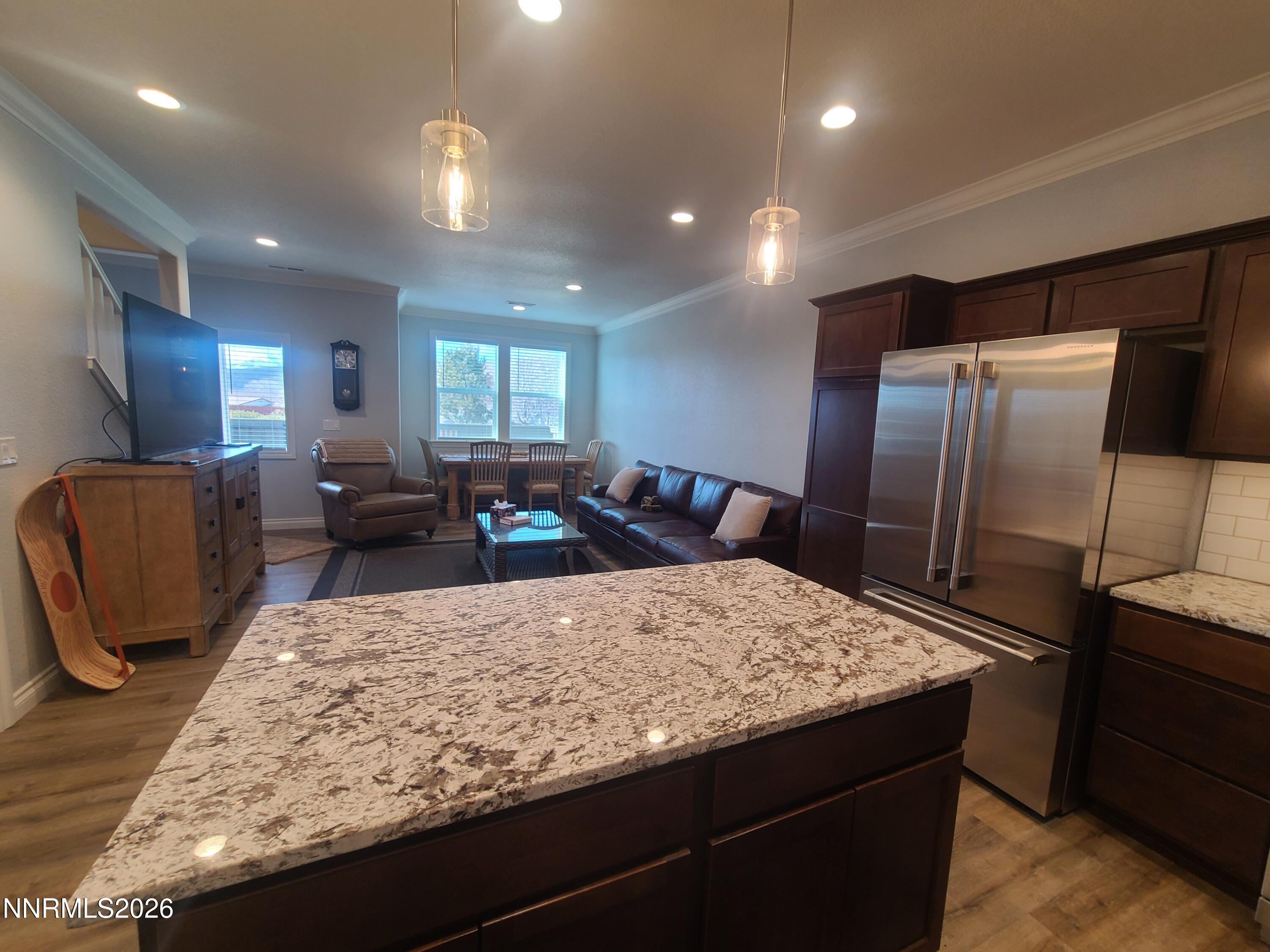 18671 Village Center Drive Reno, NV 89508 - Photo 8 of 24 Great room from kitchen