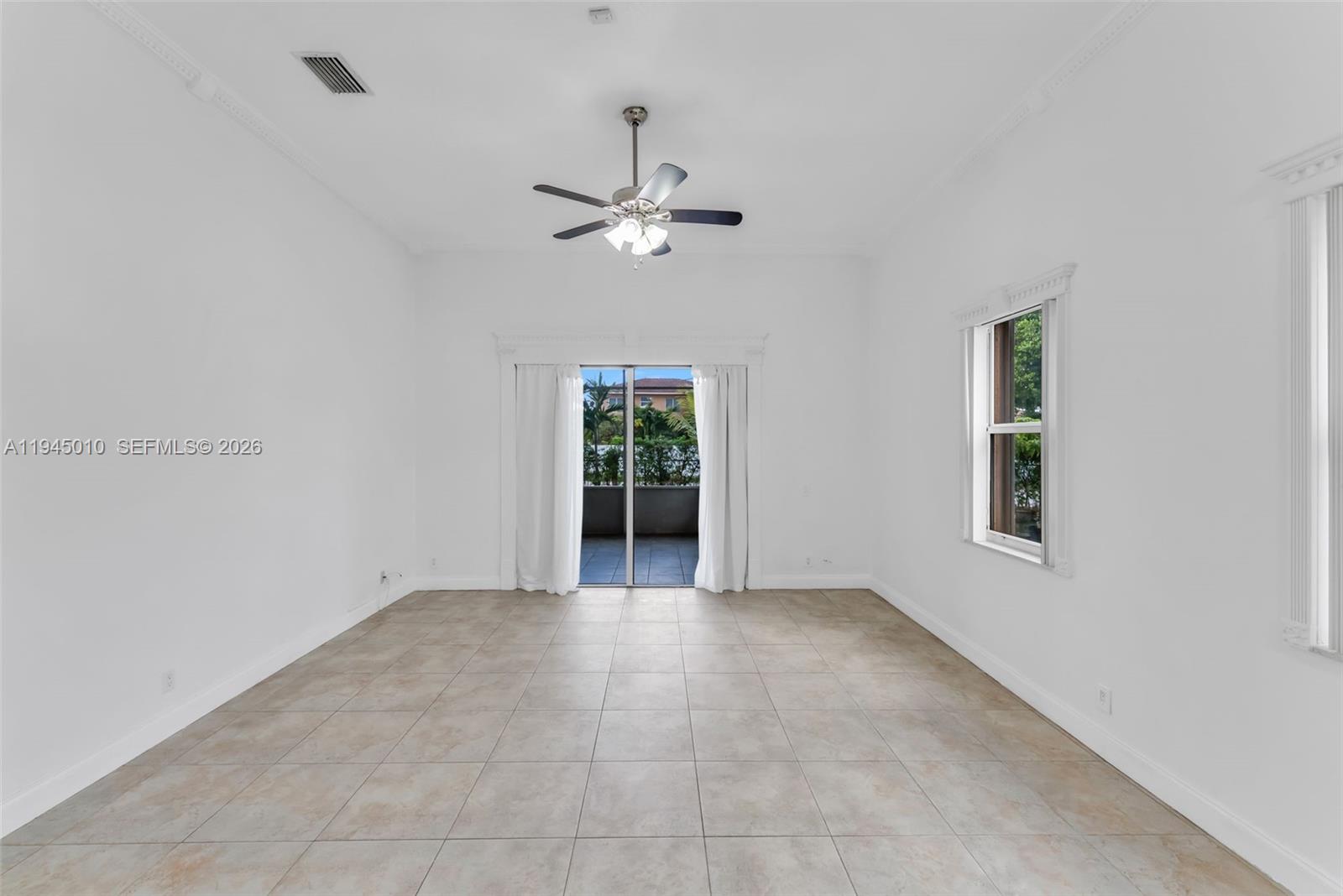 13296 Southwest 54th Court Miramar, FL 33027 - Photo 32 of 34 a view of an empty room with a window