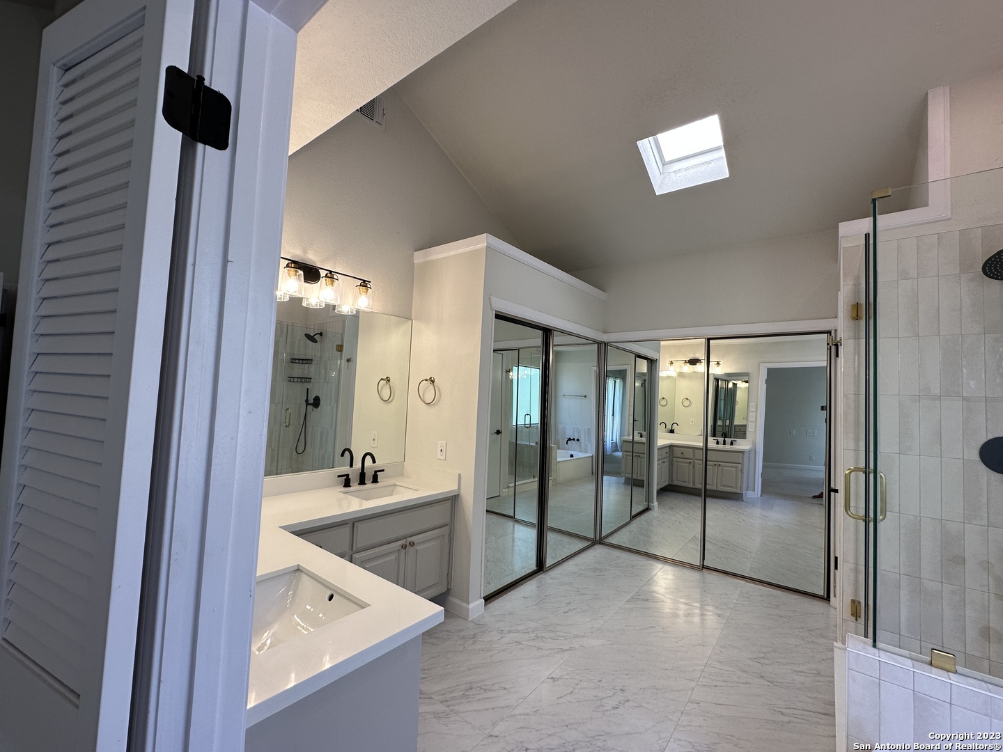 1722 Encino Spring San Antonio, TX 78259 - Photo 19 of 55 a bathroom with a tub shower and sink