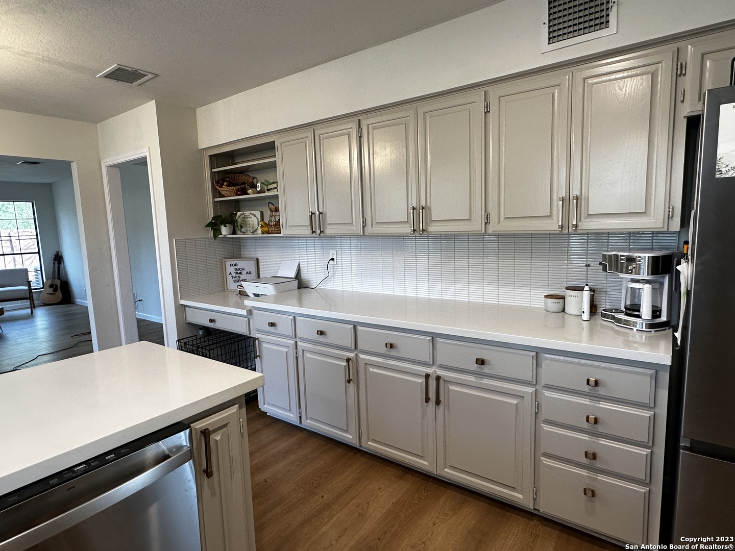 1722 Encino Spring San Antonio, TX 78259 - Photo 29 of 55 a kitchen with a sink window and cabinets