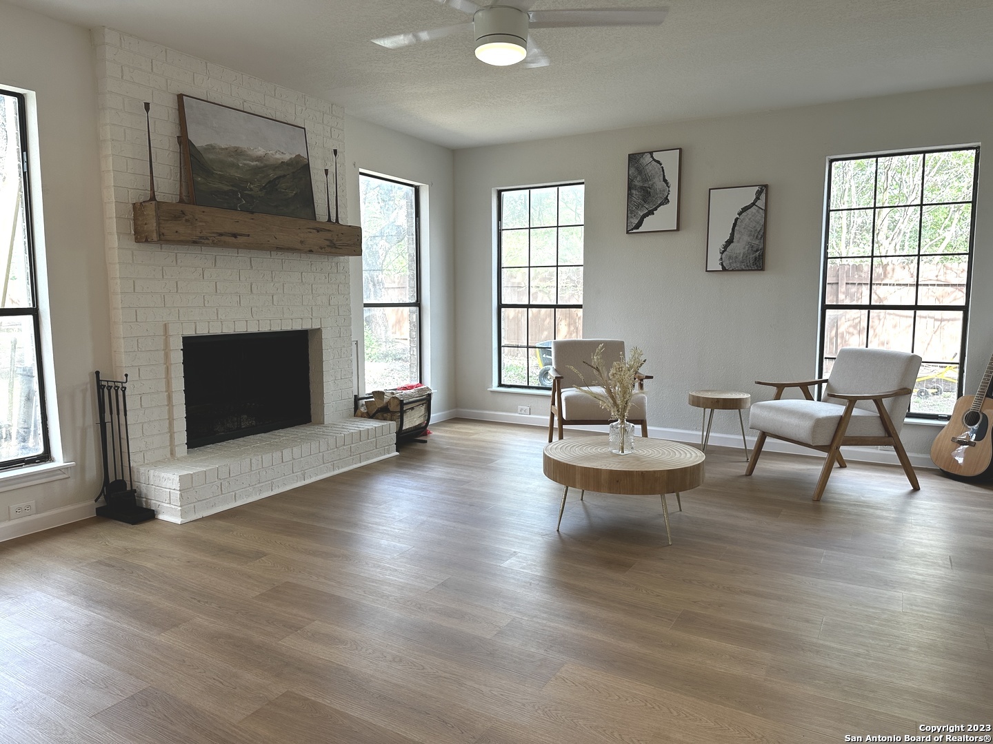 1722 Encino Spring San Antonio, TX 78259 - Photo 36 of 55 a living room with furniture and a fireplace