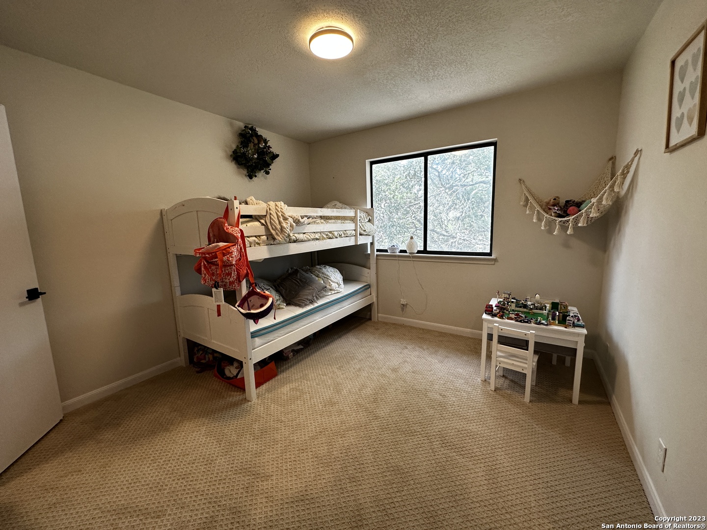 1722 Encino Spring San Antonio, TX 78259 - Photo 49 of 55 a living room with furniture and a fireplace