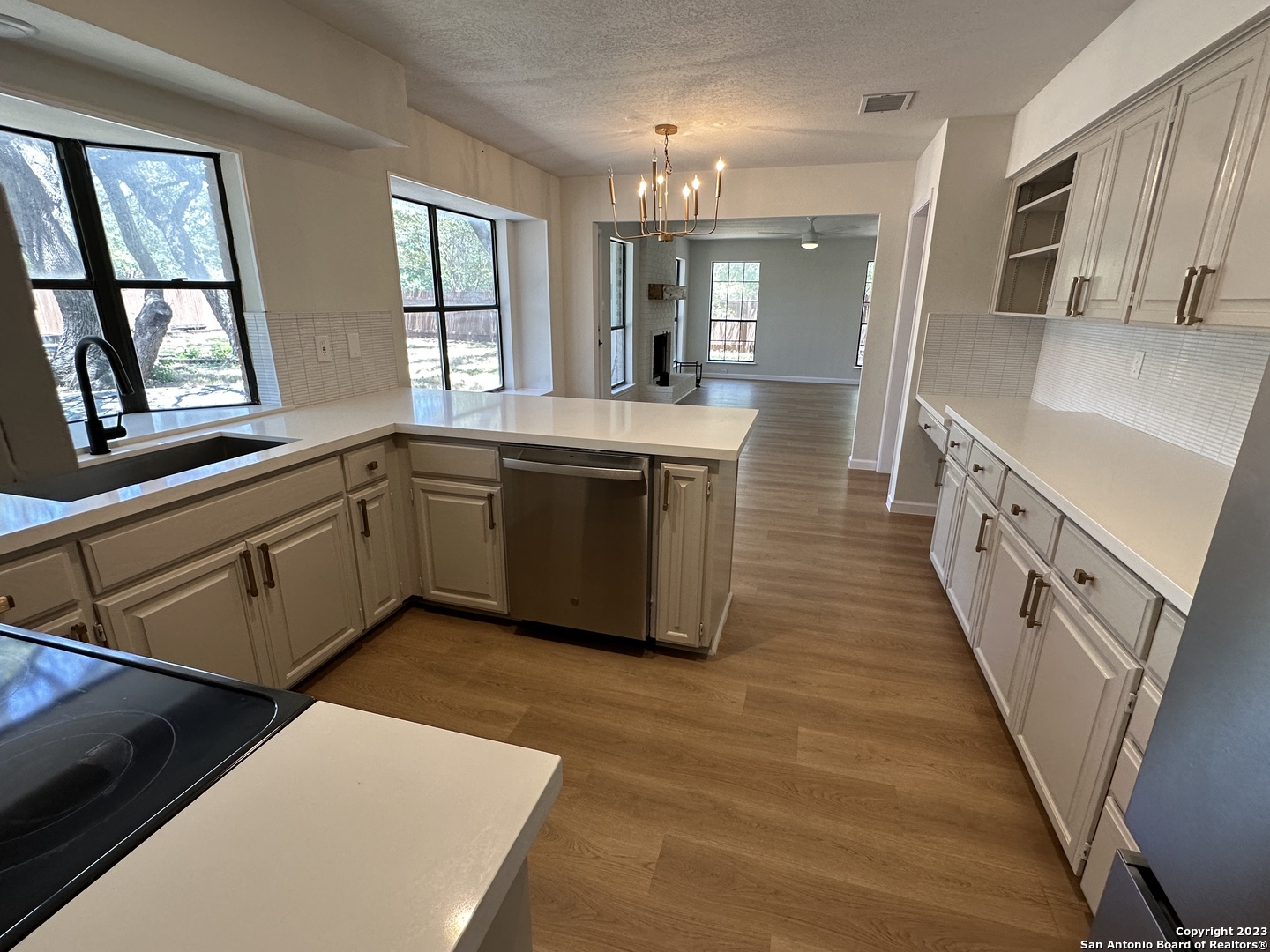 1722 Encino Spring San Antonio, TX 78259 - Photo 9 of 55 a large kitchen with stainless steel appliances granite countertop a large counter top and sink