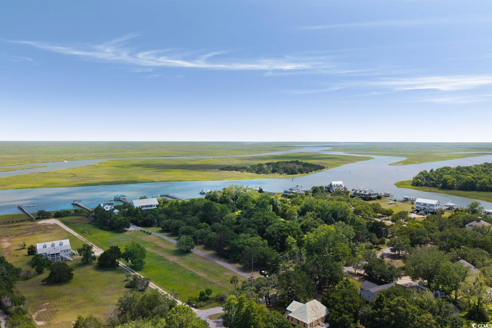 315 Lofton Court McClellanville, SC 29458 - Photo 4 of 40 Bird's eye view of a large body of water