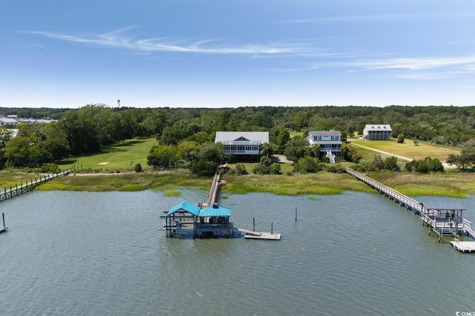 315 Lofton Court McClellanville, SC 29458 - Photo 5 of 40 Bird's eye view of a large body of water