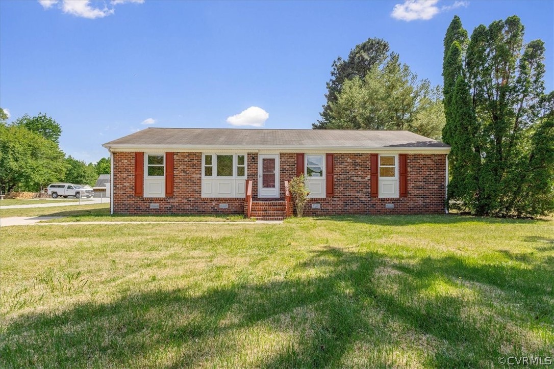 a view of a house with a backyard space