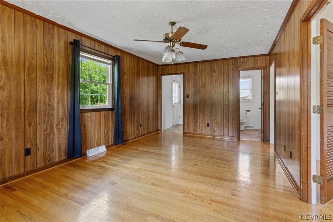 2001 Point Of Rocks Road Chester, VA 23836 - Photo 19 of 25 a view of a hallway with wooden floor and a chandelier