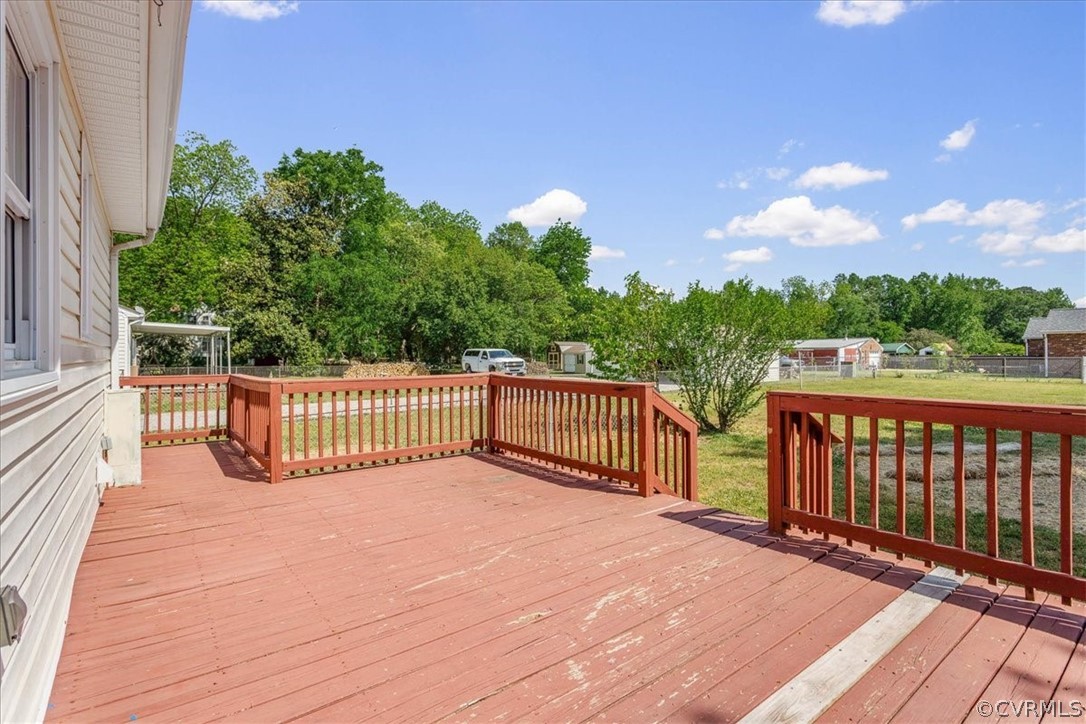 2001 Point Of Rocks Road Chester, VA 23836 - Photo 23 of 25 a view of a balcony with wooden floor