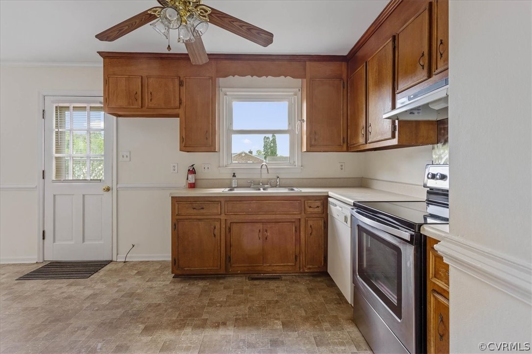 2001 Point Of Rocks Road Chester, VA 23836 - Photo 5 of 25 a kitchen with granite countertop a sink stainless steel appliances and cabinets