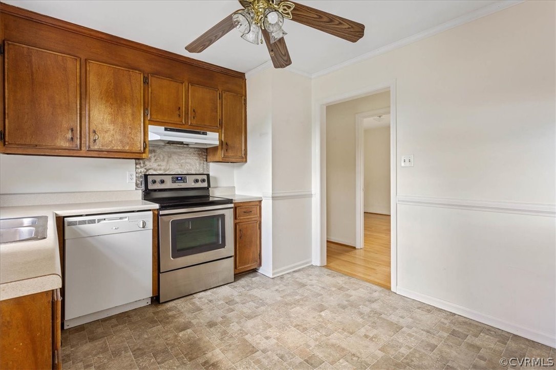 2001 Point Of Rocks Road Chester, VA 23836 - Photo 6 of 25 a kitchen with stainless steel appliances granite countertop a stove a sink and a refrigerator