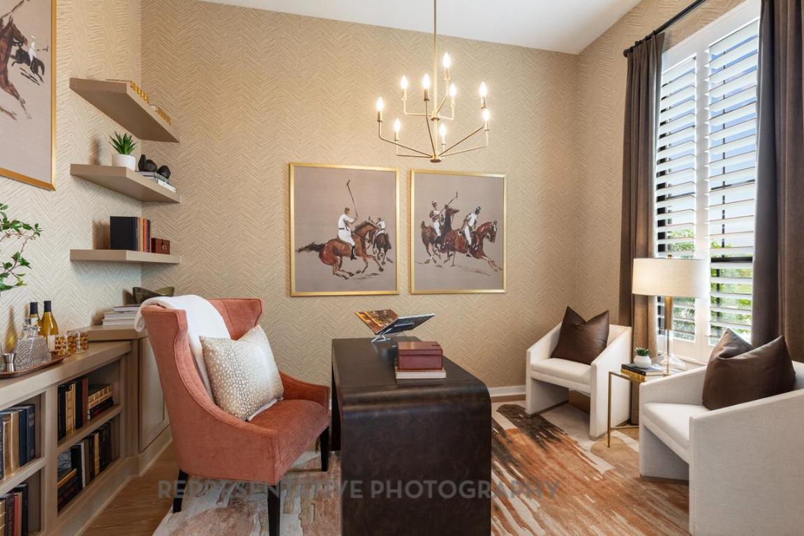 205 Leaning Rock Ridge Austin, TX 78737 - Photo 11 of 40 a living room with furniture and a chandelier