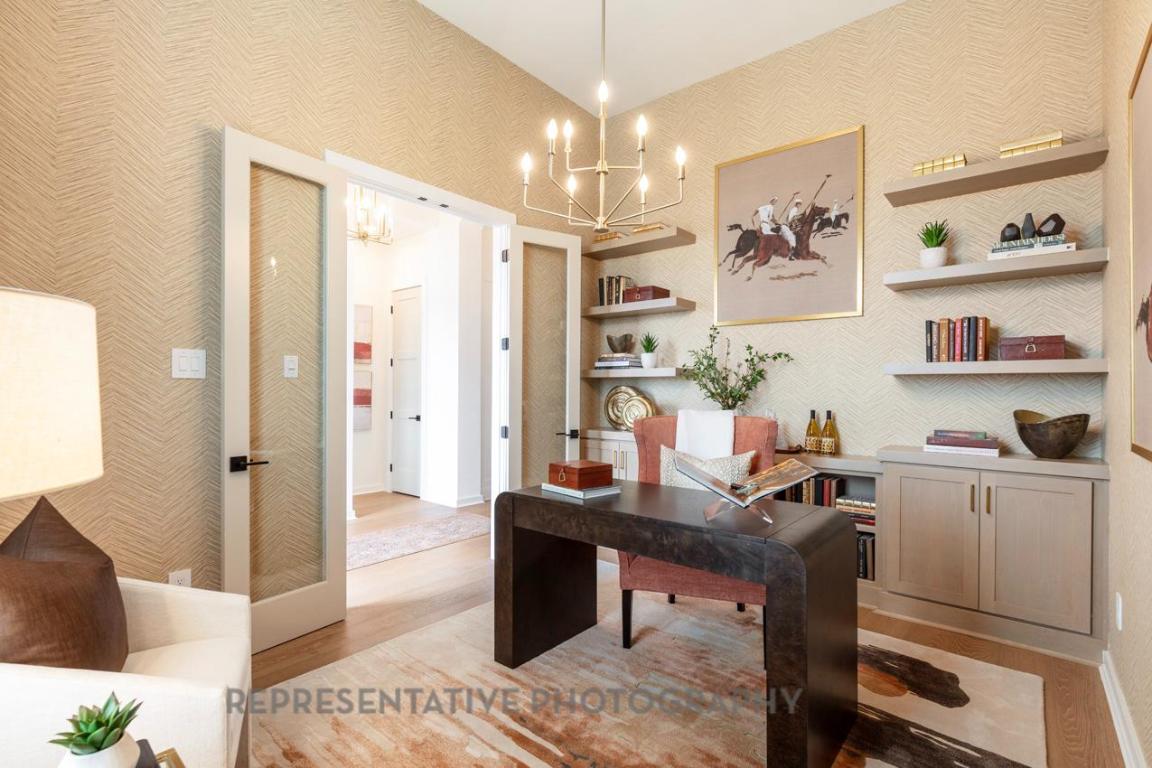 205 Leaning Rock Ridge Austin, TX 78737 - Photo 15 of 40 a view of a workspace with furniture and a window